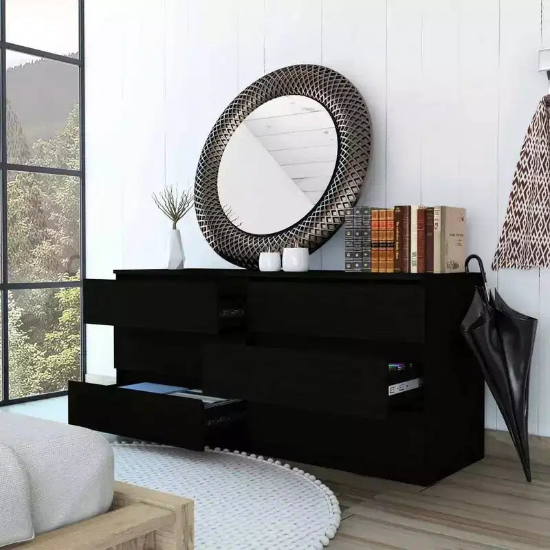 Cómoda de dormitorio con varios cajones y amplio espacio de almacenamiento