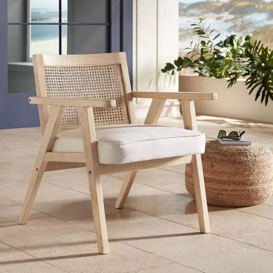 Sillón auxiliar de ratán y tela beige